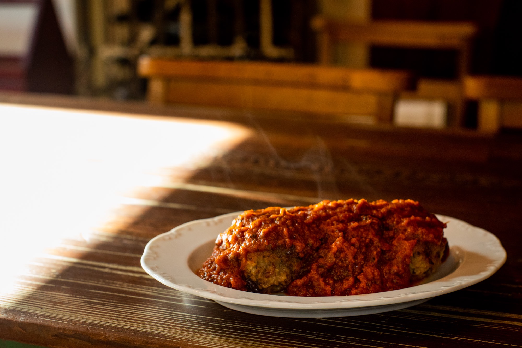 Meatballs with steam rising off.