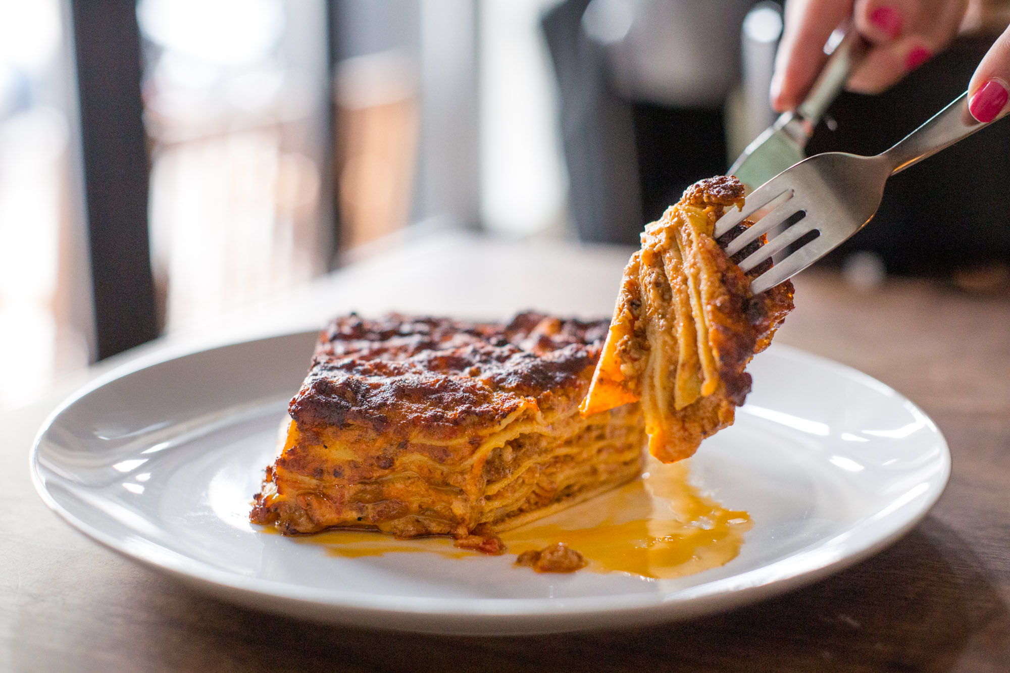 Slice of lasagna at the restaurant Antica Pesa in New York City