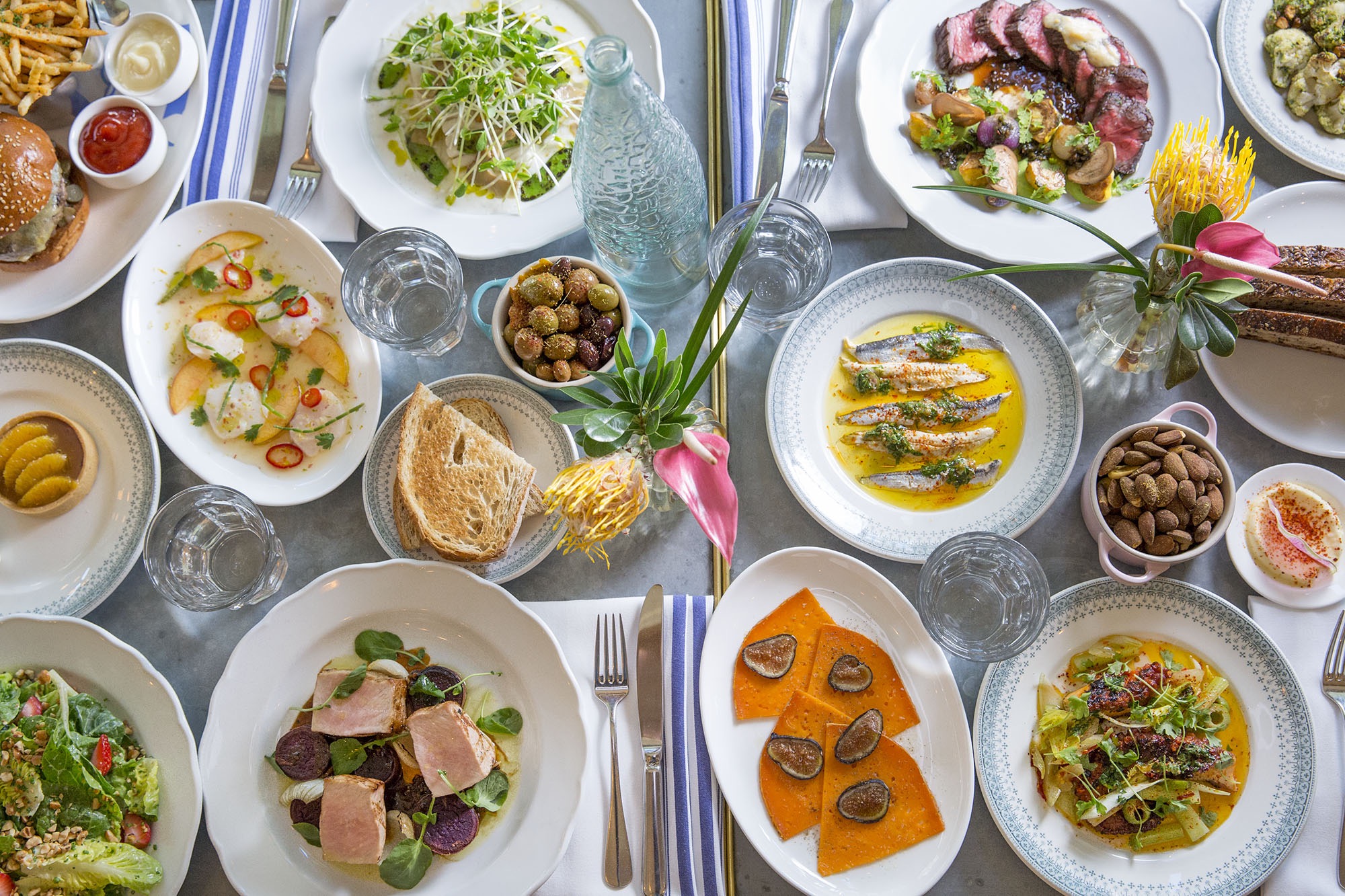 A table spread of new French food at Sauvage in Brooklyn.