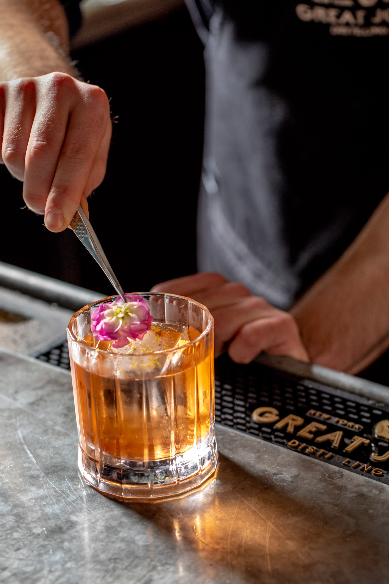 Cocktail being garnished